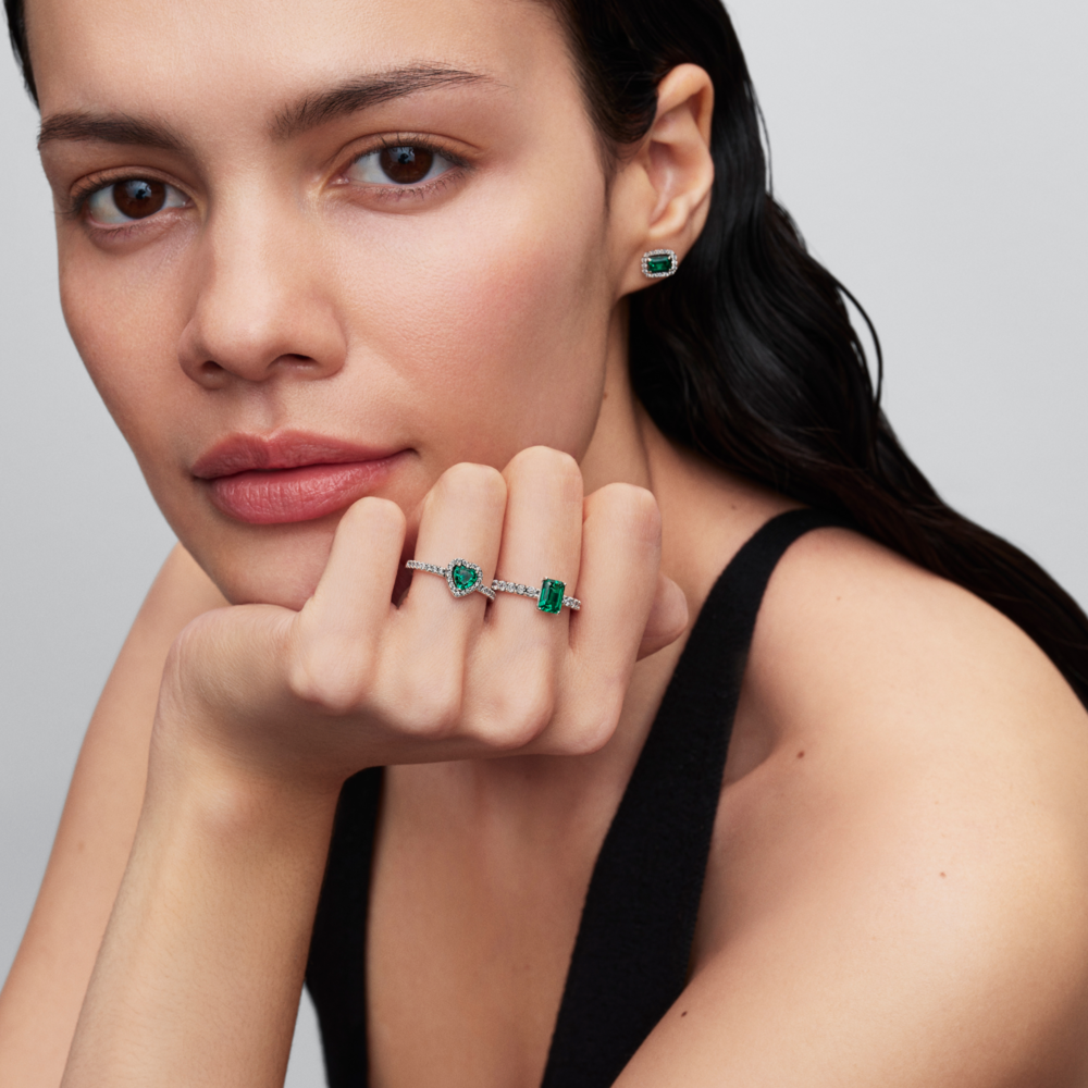 Sterling silver stud earrings with royal green crystal and clear cubic zirconia