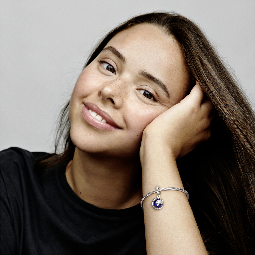Globe silver dangle with clear cubic zirconia and blue enamel
